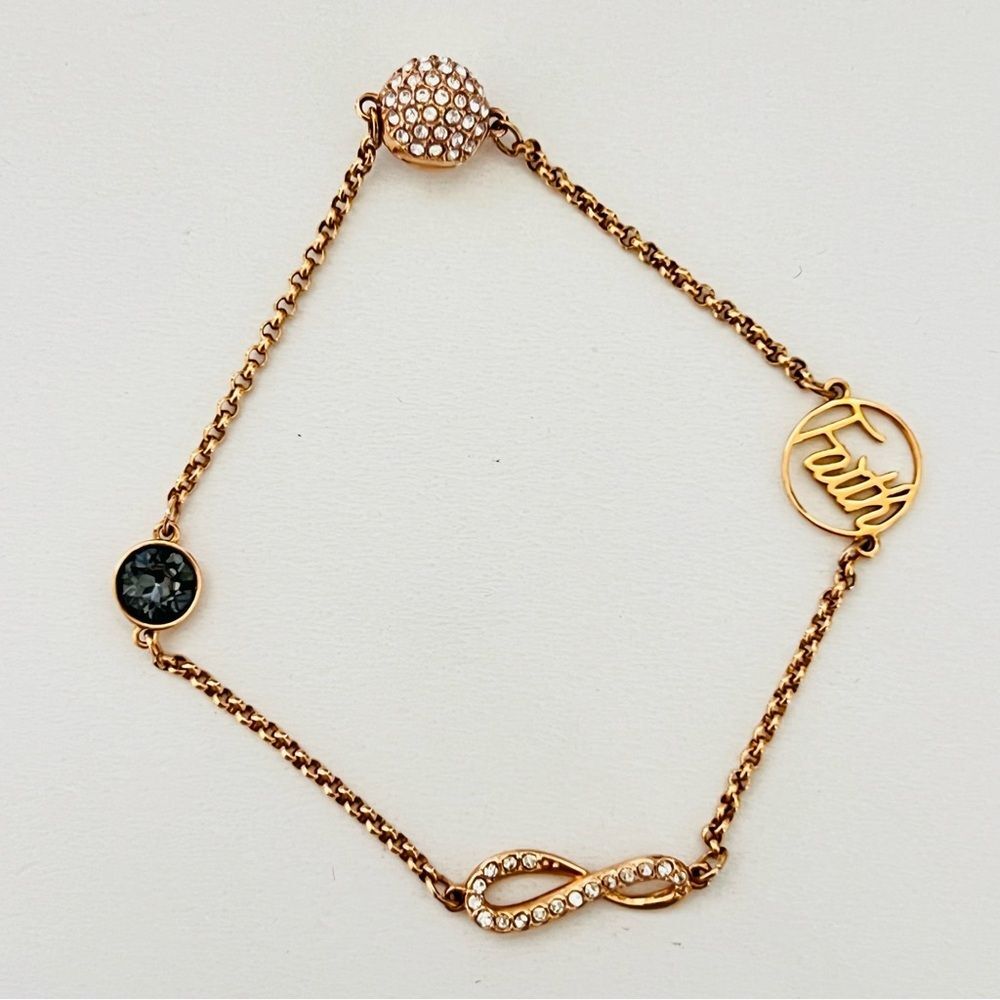 SWAROVSKI Remix Collection Bracelet with Infinity and Faith Charms